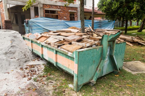 Construction site with waste materials being cleared